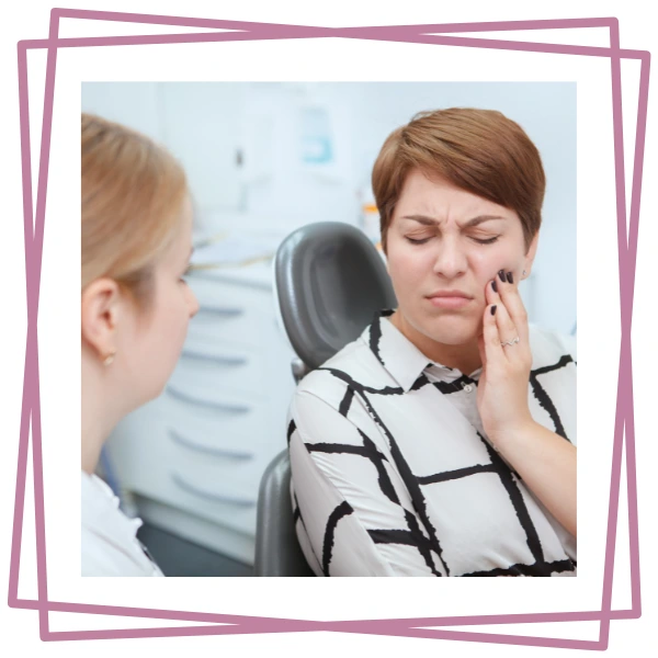 image of emergency dentist in London talking to a patient during emergency consultation