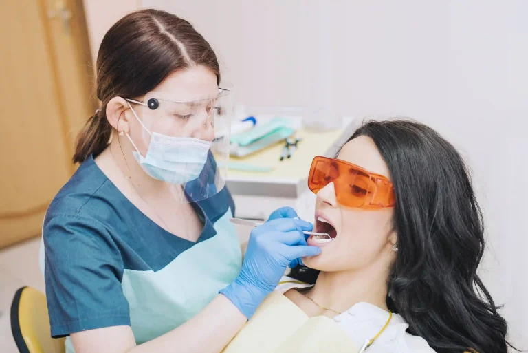 image of a dentist an patient at Liberty Dentists in London doing an examination before making the custom made night guard for the patient