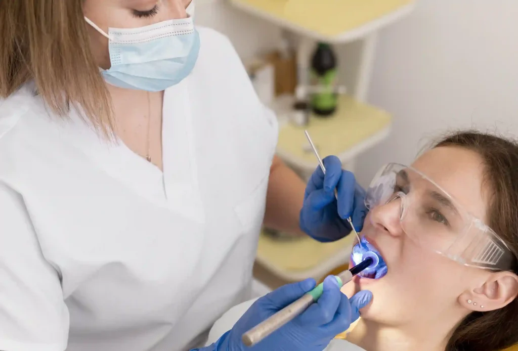 image of a patient getting white dental filling at Liberty Dentists in Shoreditch, London